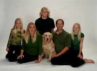 Family & pet dog with same hair color.